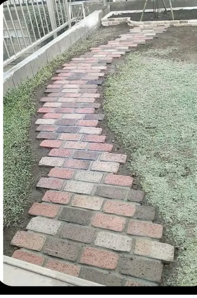 DIY Brick Walkway for a Charming Garden Path